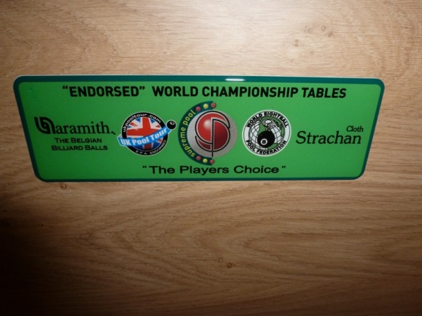 winner-badge world championship table green